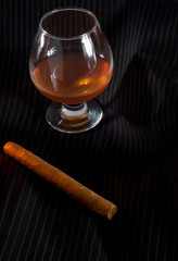 Brandy glass and cigar