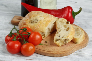 Sliced bread Ciabatta and vegetables