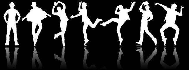 Silhouettes of dancers in dancing concept