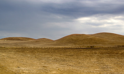 Fototapeta na wymiar Dry rolling hills