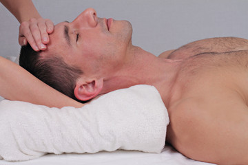 Fototapeta na wymiar Massage, Chiropractic, Osteopathy, pain relief concept. Therapist doing healing treatment on man neck