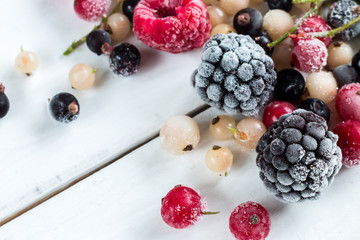 frozen berries: black currant, red currant, blackberry, blueberry, white currant. top view, macro.