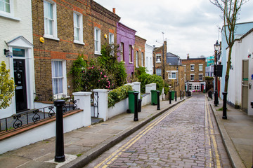 London street of typical small 19th century Victorian terraced houses - 104017673