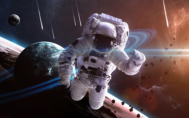 Astronaut in outer space. Spacewalk. Elements of this image furnished by NASA