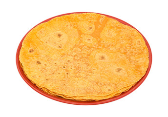 Tomato tortilla wraps on a plate isolated on a white background.