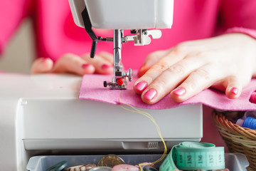 Tailor working on a sewing machine