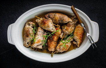 Pork rolls on porcelain dish