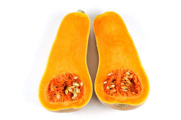 butternut squash cut in halves isolated on white background