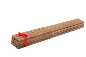 pack of wooden chopsticks isolated on white background