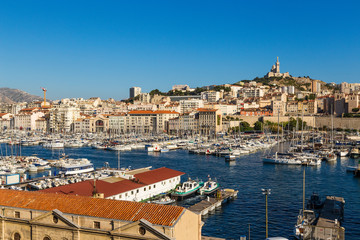 Fototapeta na wymiar Marseille. Old Port and the Basilica of Notre-Dame de la Garde