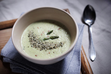 Wheat berries and milk soup with asparagus and hemp seeds 