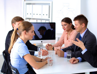 Business meeting -  manager discussing work with his colleagues