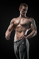 Fototapeta na wymiar Image of very muscular man posing with naked torso