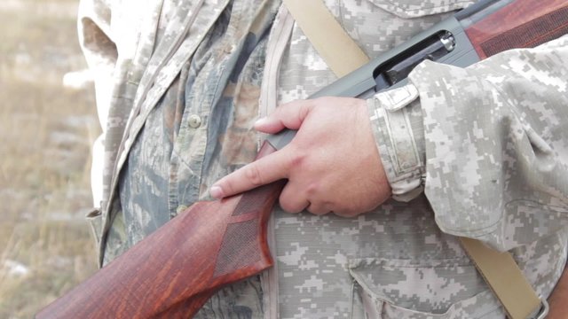 Hunter keeps a shotgun