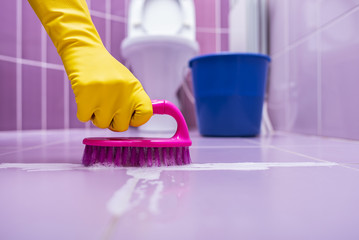 Wash the tile with a brush.