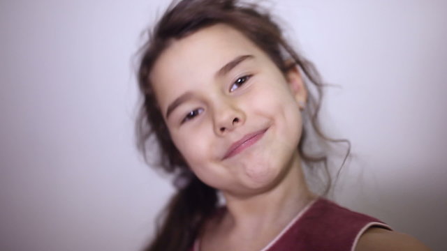 teen girl  toothless smile makes selfie