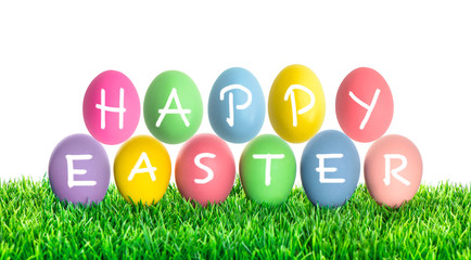 Easter eggs in green grass. HAPPY EASTER