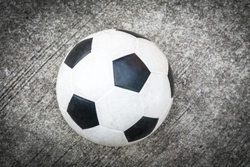 soccer ball on the cement floor.