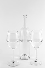 Isolated bottle and glasses