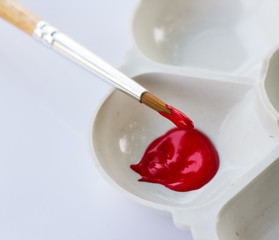art palette with red color on white