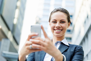 Portrait of business woman smiling outdoor