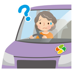 不安そうに運転をする高齢者　女性