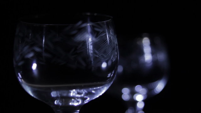Glasses with a pattern on a dark background.