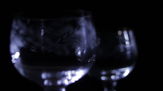 Glasses with a pattern on a dark background.