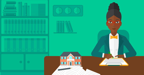 Real estate agent signing contract.