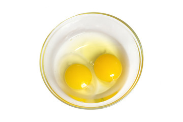 Raw eggs in a plate