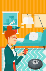 Woman with robot vacuum cleaner.
