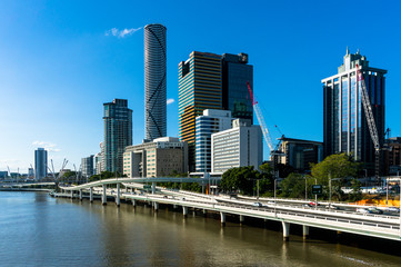 Fototapeta premium Cityscape with skyscrapers and modern bridge road