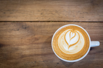 Hot art Latte Coffee on the table.