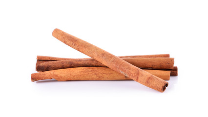 Cinnamon sticks on white background