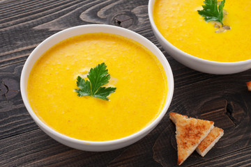 pumpkin soup with parsley leaf