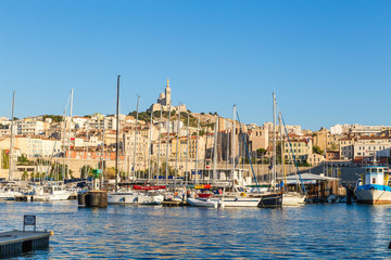 Marseille. Basilica of Notre-Dame de la Garde and yachts in the Old Port