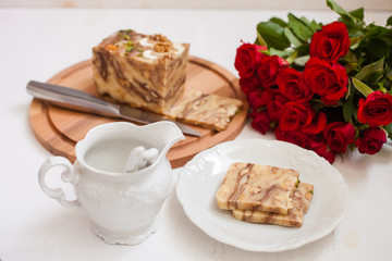 creamy fondant with a shredded nut on a plate, selective focus