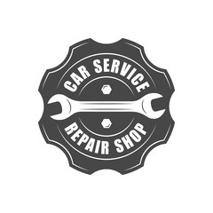 Auto service logotype, wrench and gear silhouette