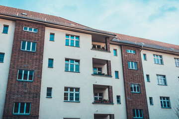 Fototapeta premium Side of large apartment building