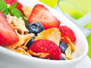 Breakfast bowl with cereals and fresh fruits