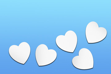 White lovely hearts over blue background