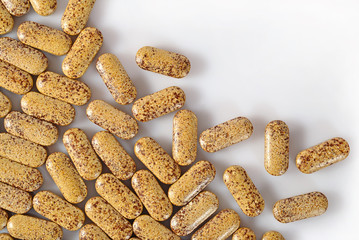 Top view of pills on a white