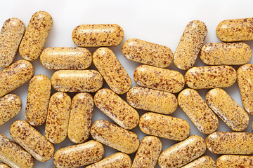 Top view of pills on a white