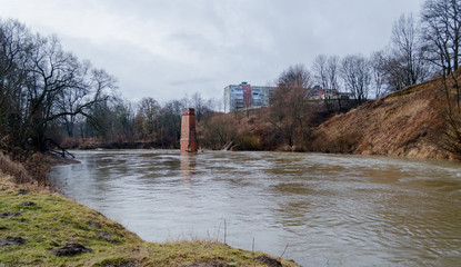 View from the Riverwalk in Chernyakhovsk, Russia of the Angrapa River as it reaches flood levels after several days of non-stop rainy weather.