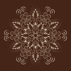 Flower mandala over dark brown