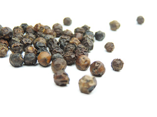 Pepper, isolated on white. Peppercorns with copy space.
