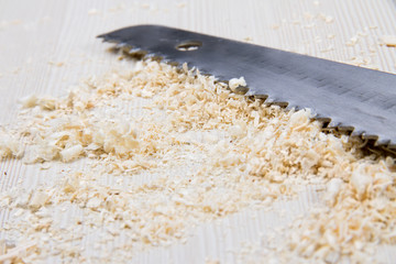 Saw and sawdust