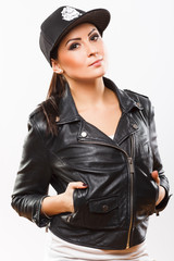 Portrait of  brunette girl wearing leather jacket