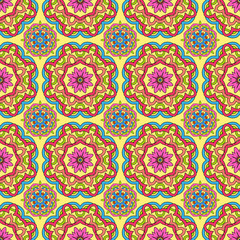 seamless pattern made from abstract circle mandalas on orange ba