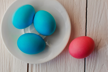 Easter pink Easter background with eggs on wooden background